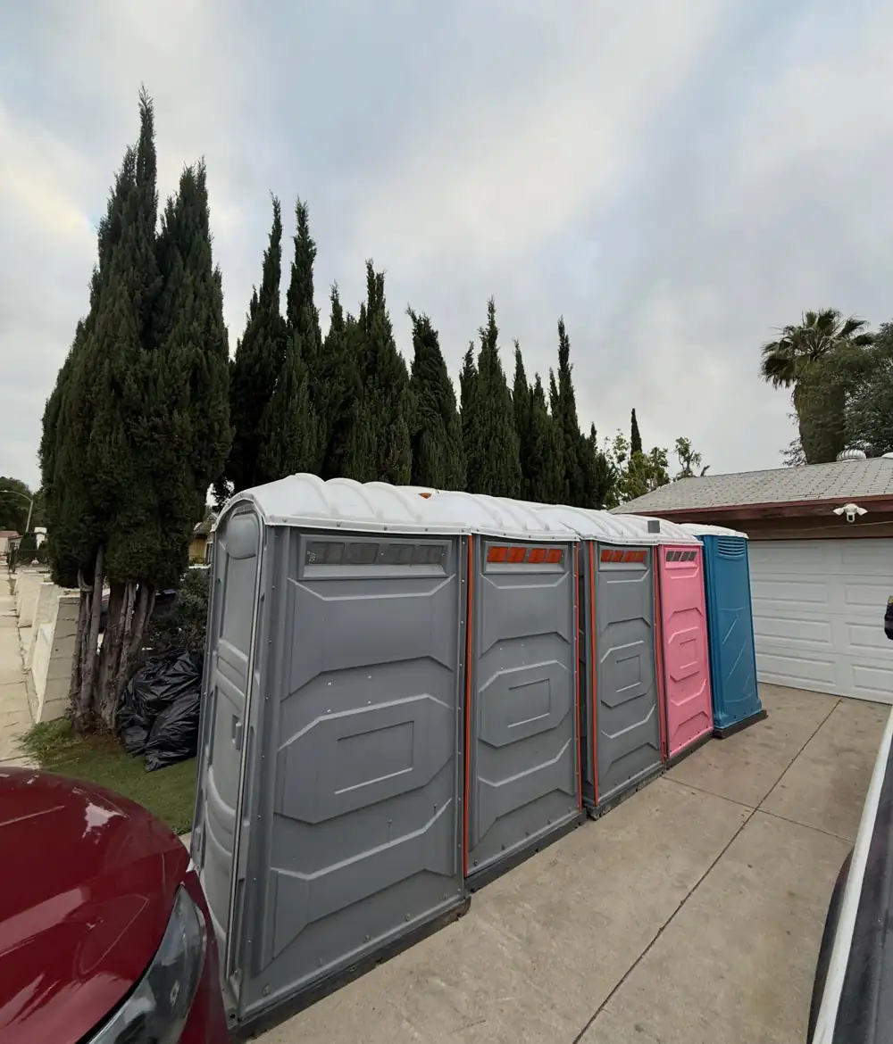 Portable toilets loaded on a trailer at the yard